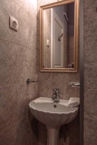 Ванная комната в Ilion Hotel