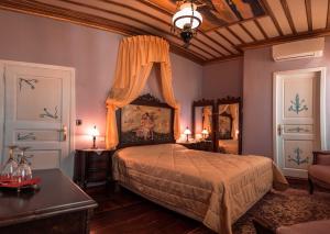 Кровать или кровати в номере Ilion Hotel