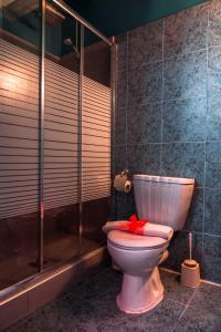 Ванная комната в Ilion Hotel