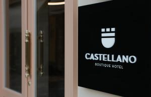 a sign on the door of a building at Castellano Hotel & Suites in Nafplio