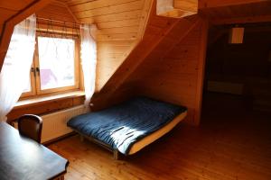 Postel nebo postele na pokoji v ubytování VILLA LUPUS