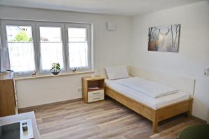 Postel nebo postele na pokoji v ubytování Boardinghouse Jungwirth-Wohnzeit