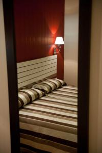 Cama o camas de una habitación en Hostal Bcn 46
