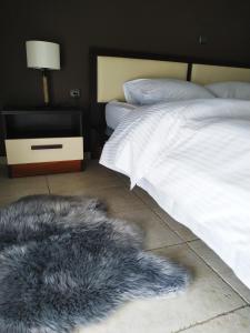 Posteľ alebo postele v izbe v ubytovaní Holiday Nest & parking