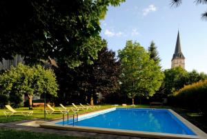 Bazén v ubytování Gasthof Hotel Moser nebo v jeho okolí