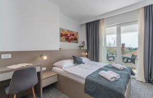 Postel nebo postele na pokoji v ubytování Villa Ladavac B&B