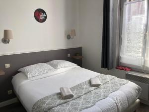 Postel nebo postele na pokoji v ubytování Le Cottage + 8 fotografií