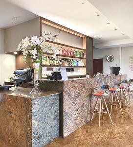 Lounge nebo bar v ubytování Hotel & Residence Castelli
