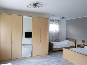 Postel nebo postele na pokoji v ubytování Fewo Kretschmann