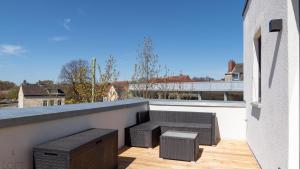 Balkón nebo terasa v ubytování LÜTTES LOFT Boutique Hotel