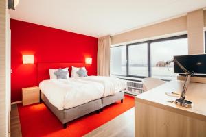 Voodi või voodid majutusasutuse Delta Hotel toas