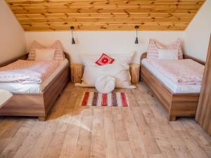 Postel nebo postele na pokoji v ubytování Chata Ondrejanka