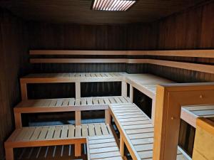 a cabin with four bunk beds in it at Hotel Kemijärvi in Kemijärvi