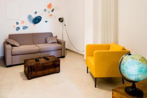 Area soggiorno di BOTTASSO17 Guest House a due passi dal mare