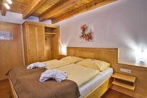 Postel nebo postele na pokoji v ubytování Apartment Dahoam