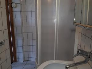 a bathroom with a shower and a sink at Monteurunterkunft Oberaula in Oberaula