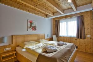 Postel nebo postele na pokoji v ubytování Apartment Dahoam