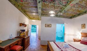 Ένα ή περισσότερα κρεβάτια σε δωμάτιο στο Loreta Hotel