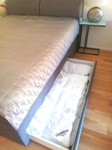 a mattress is laying on a bed in a room at INSIDER Appartement in Schönwald +13 photos