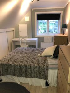 Llit o llits en una habitació de Stryn - house by the river