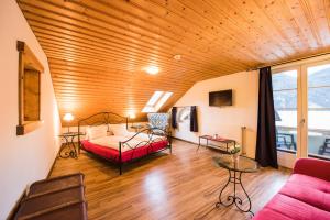 Katil atau katil-katil dalam bilik di Hotel Brienzerburli