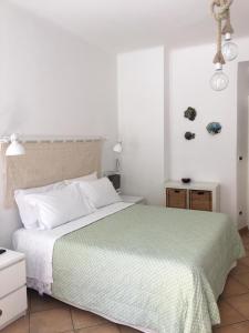 Кровать или кровати в номере Soffio Di Mare