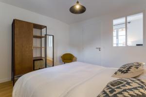 Cama o camas de una habitación en DIFY Vitton - Masséna