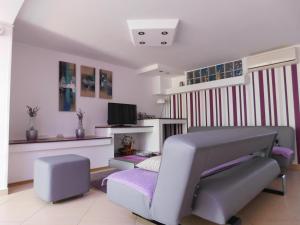 Et tv og/eller underholdning på Apartmani Tognon