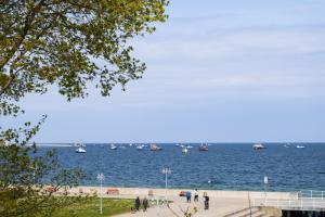 a large body of water with boats in the water at 29 apart in Gdynia
