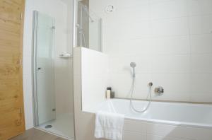 Kúpeľňa v ubytovaní Berg' & Bluamen Appartements Stubai