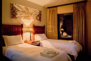 African Safari Lodge客房内的一张或多张床位