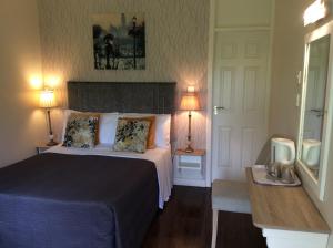 Katil atau katil-katil dalam bilik di The Gardens guest accommodation