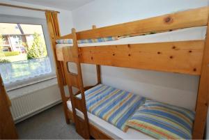 Bunk bed o mga bunk bed sa kuwarto sa Medemufer