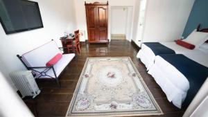Postel nebo postele na pokoji v ubytování Hotel Aguere