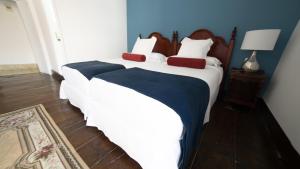 Postel nebo postele na pokoji v ubytování Hotel Aguere