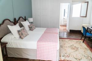 Postel nebo postele na pokoji v ubytování Hotel Aguere