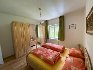 Posteľ alebo postele v izbe v ubytovaní Emily Elisa Traum Ferienwohnung mit atemberaubenden Seeblick
