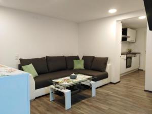 A seating area at Ferienhaus Bauer Wohnung 2 Még 21 kép