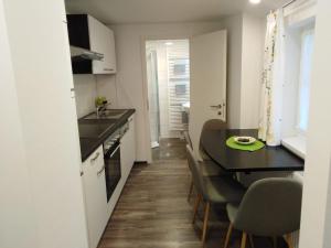 A kitchen or kitchenette at Ferienhaus Bauer Wohnung 2