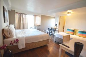 Ένα ή περισσότερα κρεβάτια σε δωμάτιο στο KV1009 Waikiki 2463 Kuhio Ave Honolulu