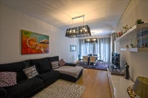 Istumisnurk majutusasutuses Lovely apartment near airport and Nations Park, with garage