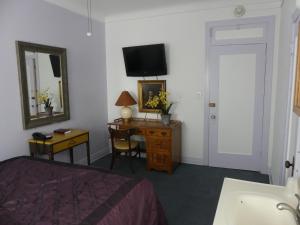 Postel nebo postele na pokoji v ubytování Hotel del Flores