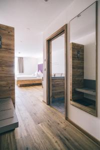 Postel nebo postele na pokoji v ubytování Hotel Restaurant Kochschule Rössle