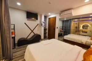 Postel nebo postele na pokoji v ubytování EROS Hotel - Love Hotel