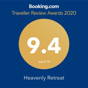 a yellow circle with the number nine and the text travelling review awards at Heavenly Retreat in Halls Gap