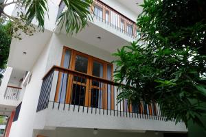 Uma varanda ou terraço em Liberta Malioboro South