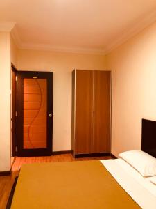 Postel nebo postele na pokoji v ubytování Hotel Chua Gin