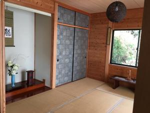 Ліжко або ліжка в номері 屋久島シエスタYakushima Entire house with a wonderful view