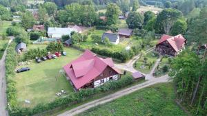 an aerial view of a house with a large yard at Gościniec Jawor in Ruciane-Nida