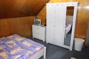 Postel nebo postele na pokoji v ubytování Turistická Chata Pláně